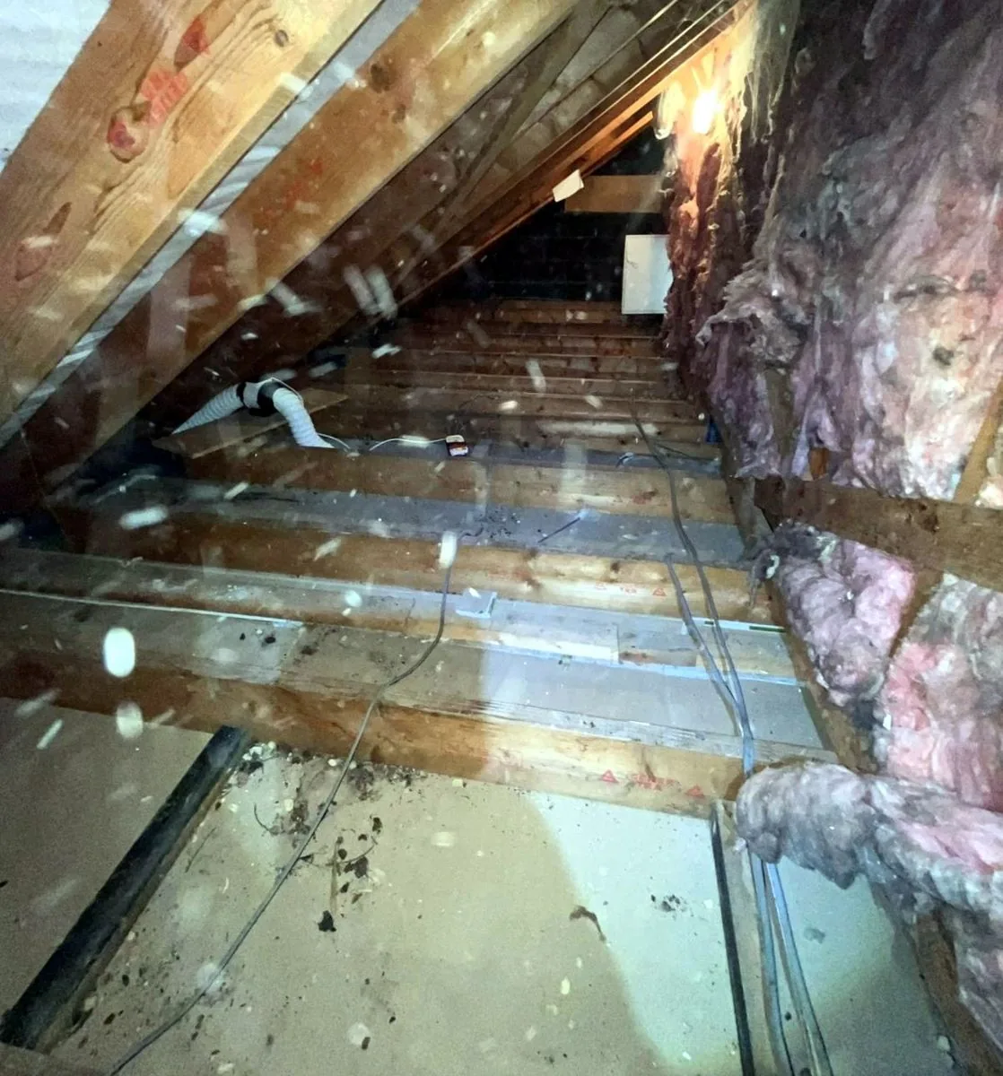 Loft joists cleared of old boards and fibreglass in County Durham