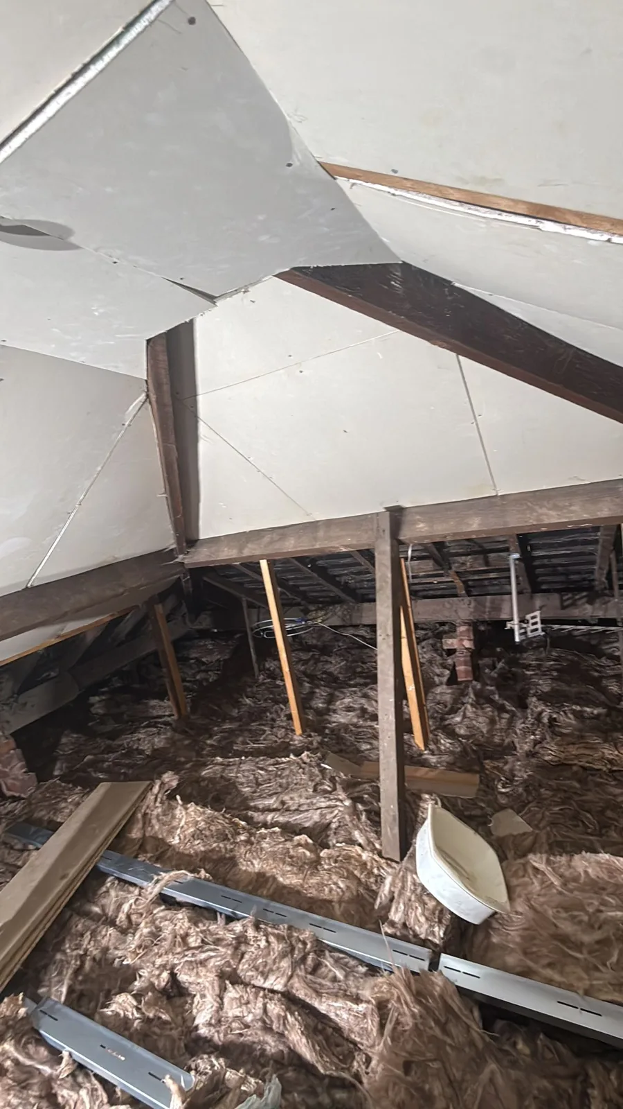Aldridge loft during loft insulation with new mineral wool between the joists