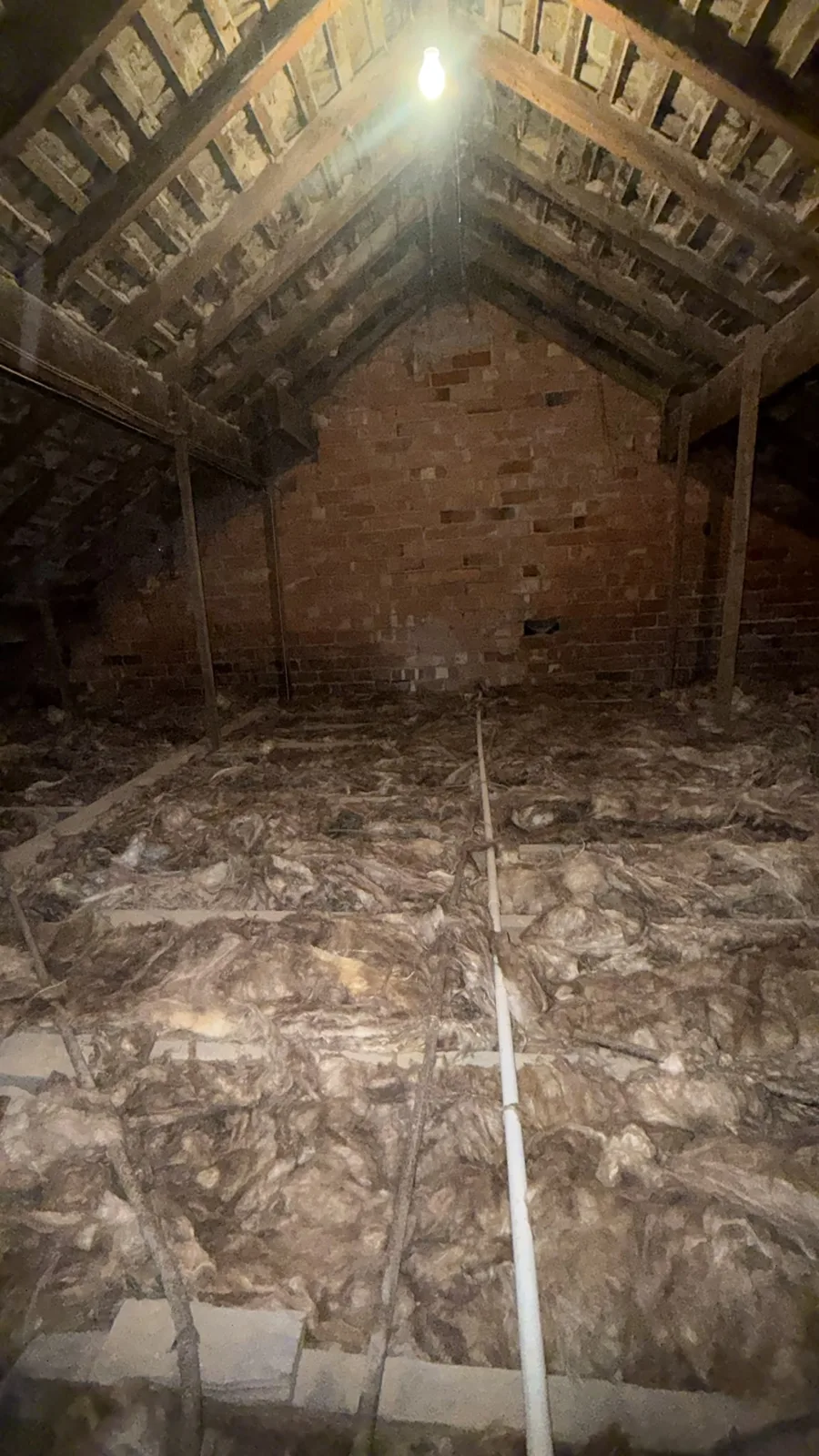 New Knauf mineral wool loft insulation laid across a loft near Garstang