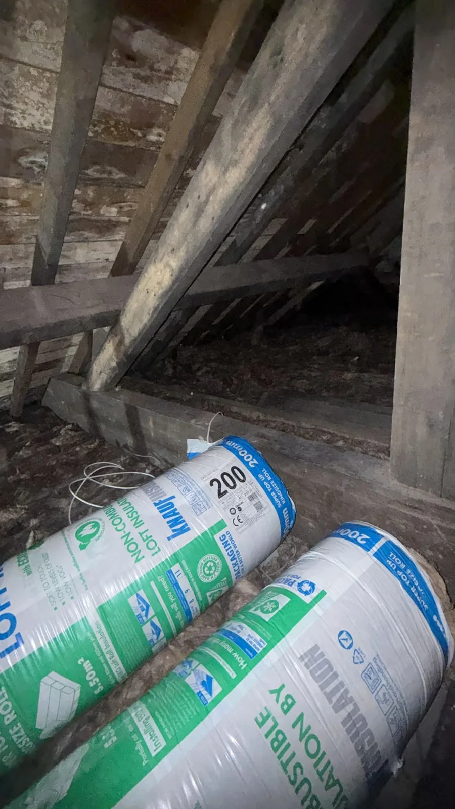 Knauf 200mm loft insulation rolls in the loft ready to lay near Macclesfield