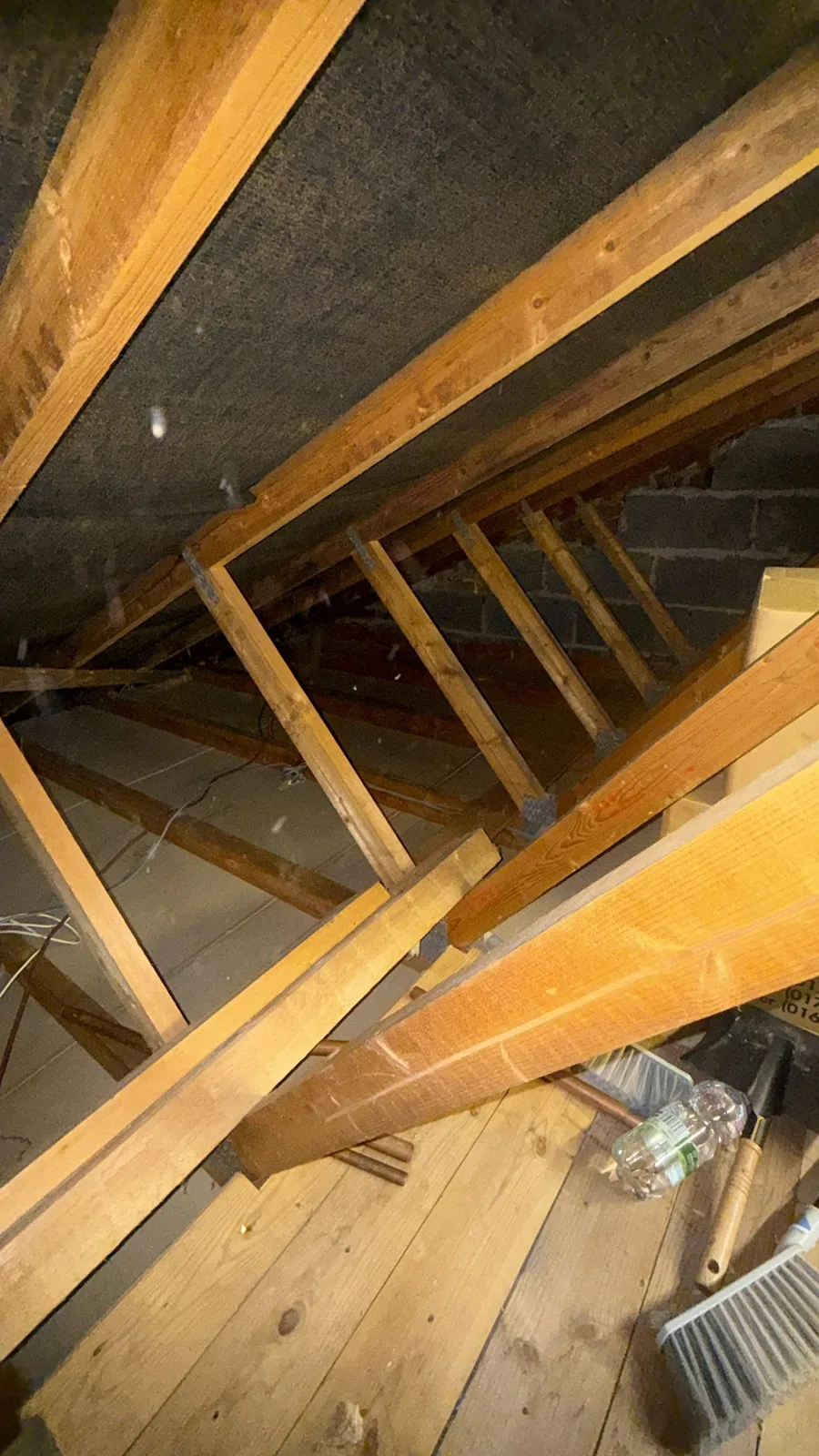 Roof timbers and cleared loft floor in Sandbach during loft insulation removal