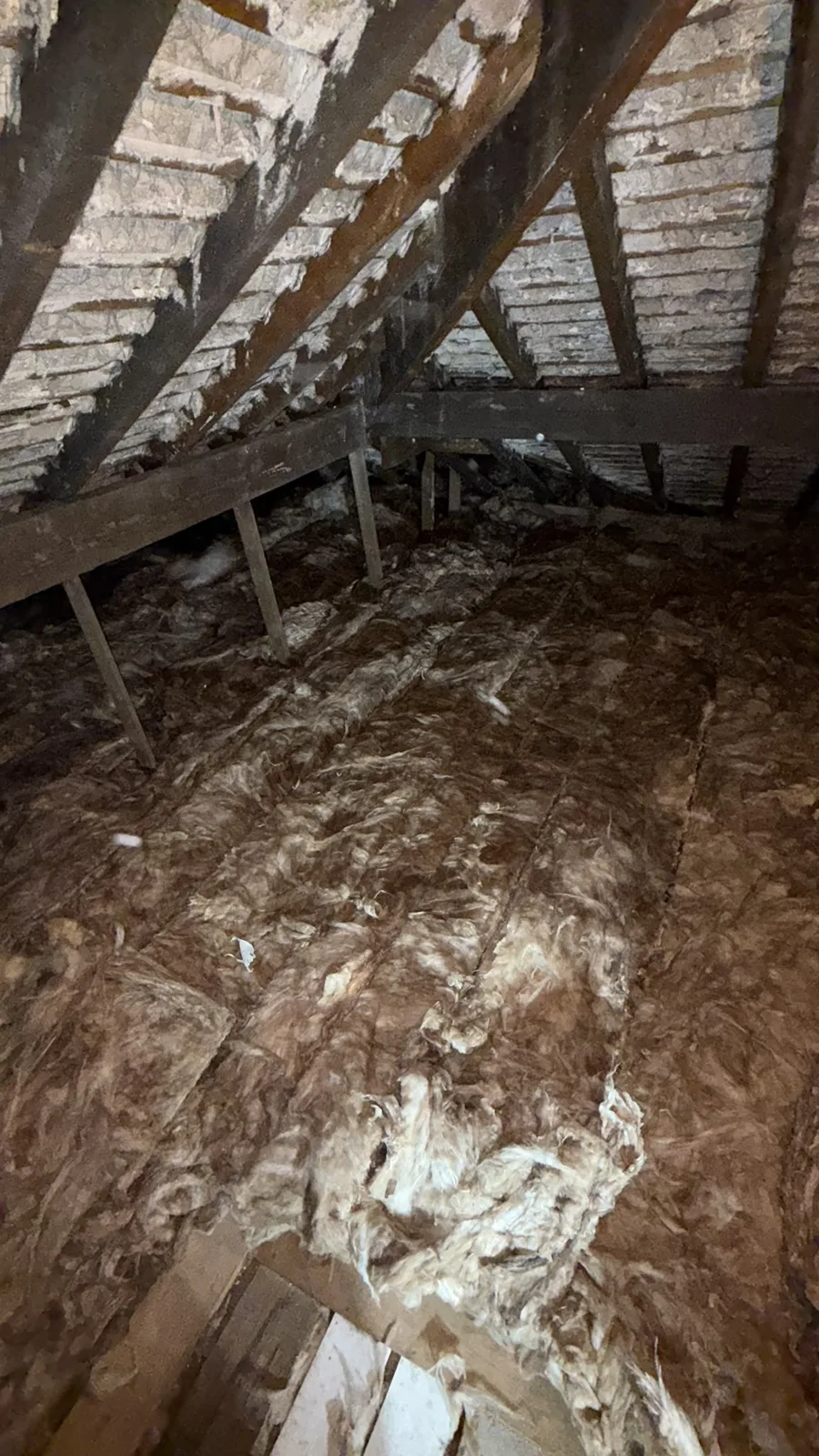 Finished Warrington loft with 300mm of mineral wool insulation across the floor