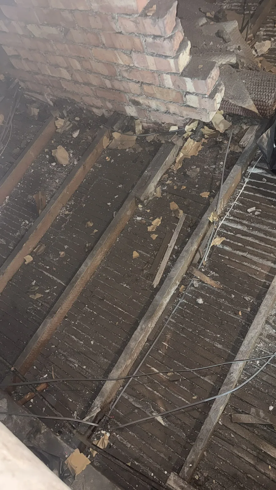 Warrington loft cleared back to the bare joists before new loft insulation