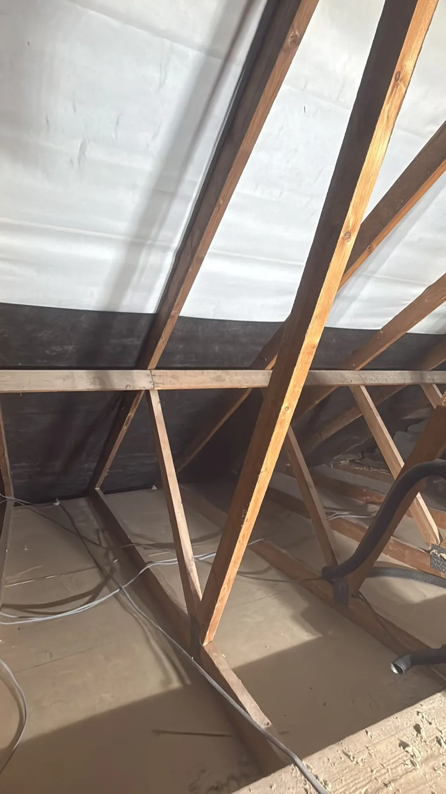 Worcester loft cleared and cleaned between the joists before new loft insulation