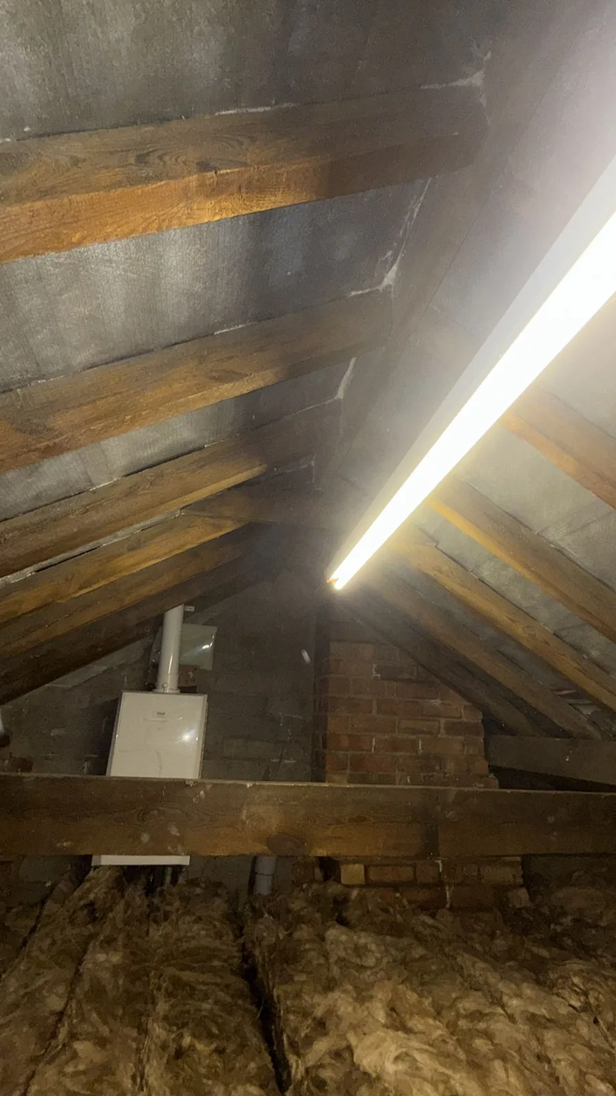 Lit roof space in Beverley cleared of spray foam with new loft insulation