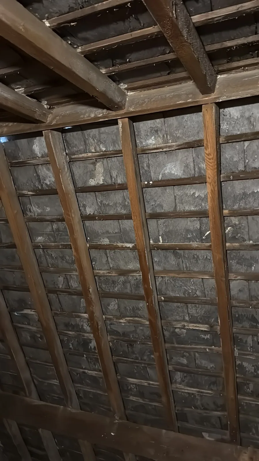 Rafters and roof cleared of open cell spray foam in a Birmingham loft
