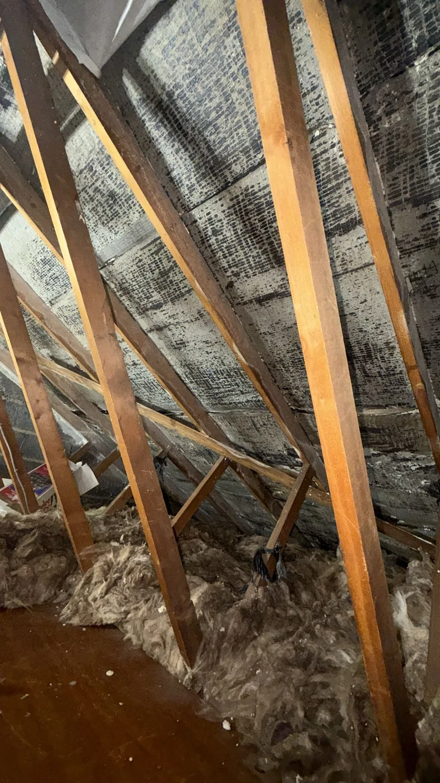 Underside of the roof cleared of spray foam during spray foam removal in Coventry