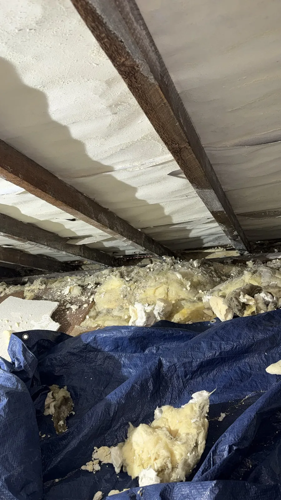 Oldham loft on day one of open cell spray foam removal