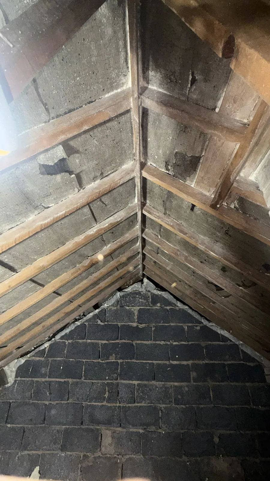 Shrewsbury loft roof cleared back to the bitumen felt and rafters after spray foam removal