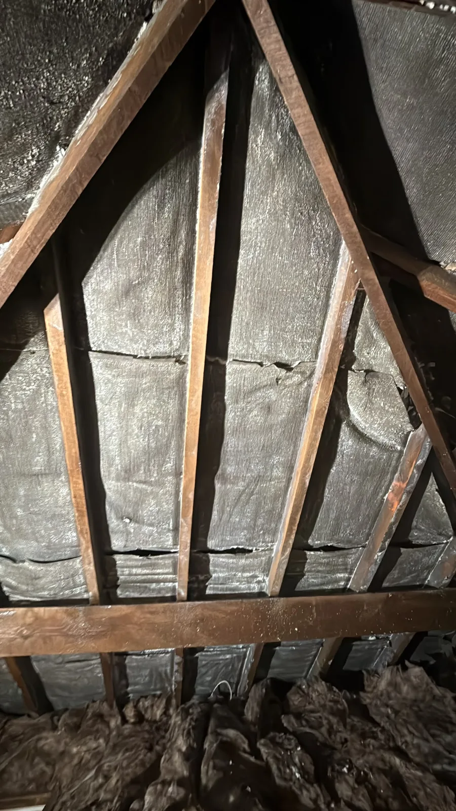 Bitumen felt and rafters cleared of open cell spray foam in a Wolverhampton loft