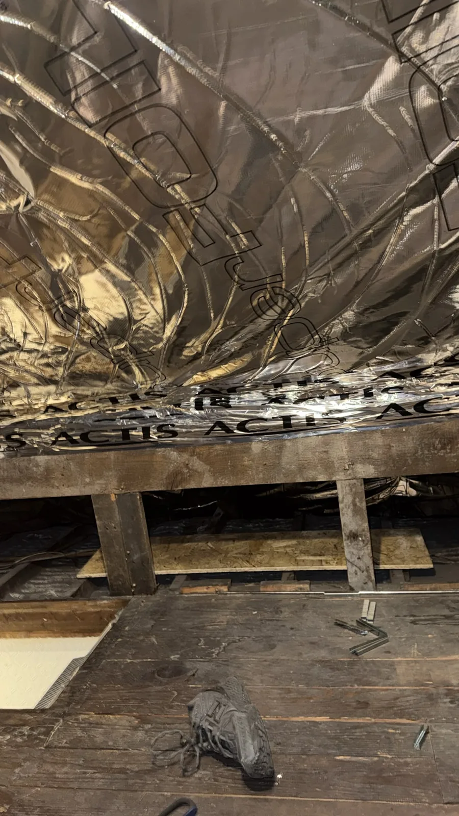 Manchester loft roof slope finished with SuperFOIL insulation above a boarded floor